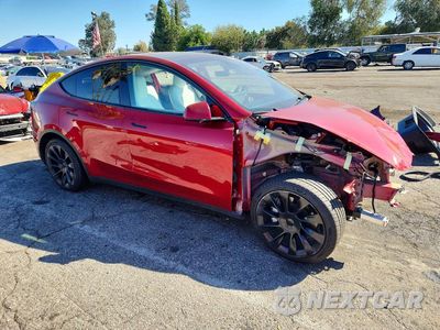 Czwarte zdjęcie samochodu z boku: 2024 TESLA MODEL Y VIN:7SAYGDED2RF011150 - miniatura