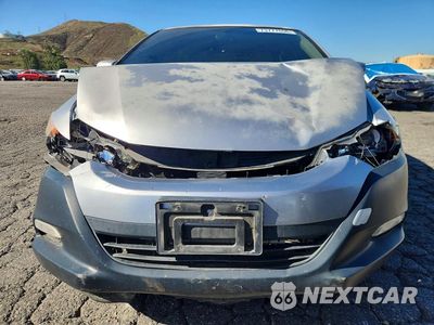Piąte zdjęcie samochodu w środku: 2010 HONDA INSIGHT EX VIN:JHMZE2H71AS009493 - miniatura