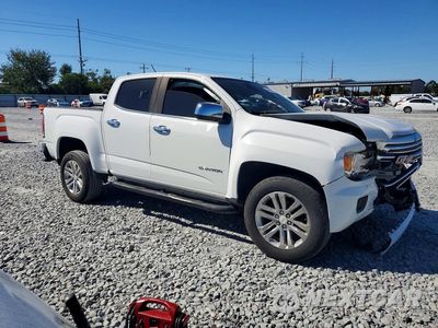 Czwarte zdjęcie samochodu z boku: 2018 GMC CANYON SLT VIN:1GTG5DEN2J1292404 - miniatura