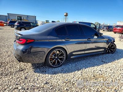 Trzecie zdjęcie samochodu z tyłu: 2021 BMW M5 VIN:WBS83CH04MCG67007 - miniatura