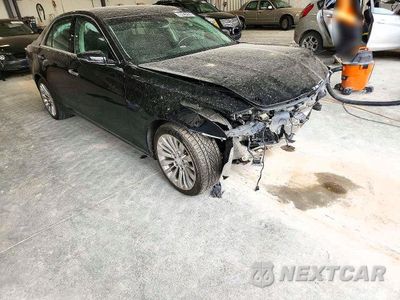 Czwarte zdjęcie samochodu z boku: 2017 CADILLAC CTS LUXURY VIN:1G6AX5SX5H0177049 - miniatura