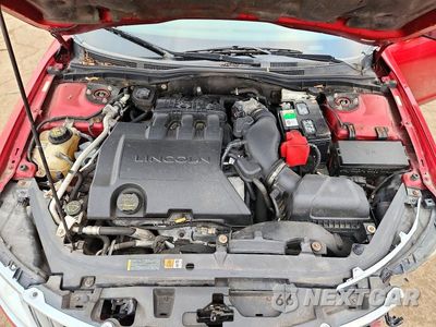 Zdjęcie 11 z 12 samochodu: 2012 LINCOLN MKZ VIN:3LNHL2GC6CR810481 - miniatura