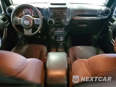 Zdjęcie 8 z 13 samochodu: 2015 JEEP WRANGLER UNLIMITED SPORT VIN:1C4BJWDG0FL529584 - miniatura