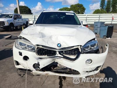 Piąte zdjęcie samochodu w środku: 2014 BMW X5 XDRIVE35I VIN:5UXKR0C58E0C24793 - miniatura