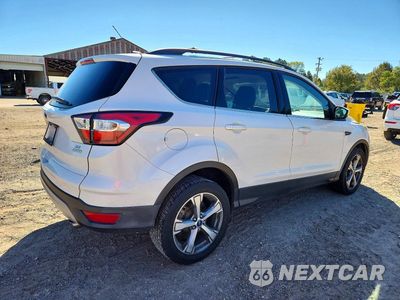 Trzecie zdjęcie samochodu z tyłu: 2017 FORD ESCAPE SE VIN:1FMCU0GD2HUC43447 - miniatura