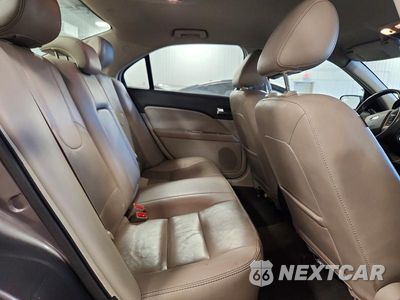 Zdjęcie 10 z 12 samochodu: 2011 FORD FUSION SEL VIN:3FAHP0JA3BR258401 - miniatura