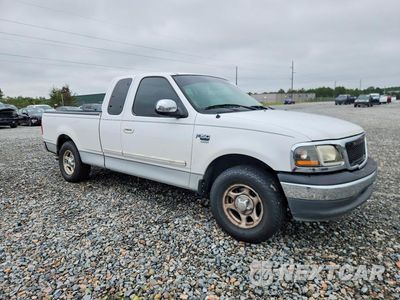 Czwarte zdjęcie samochodu z boku: 2001 FORD F150 VIN:1FTRX17L61KF03773 - miniatura
