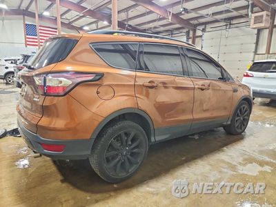 Trzecie zdjęcie samochodu z tyłu: 2017 FORD ESCAPE SE VIN:1FMCU9G99HUE28322 - miniatura