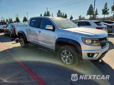 Czwarte zdjęcie samochodu z boku: 2016 CHEVROLET COLORADO Z71 VIN:1GCGSDE33G1246421 - miniatura