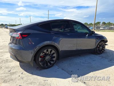 Trzecie zdjęcie samochodu z tyłu: 2022 TESLA MODEL Y VIN:7SAYGDEF9NF373813 - miniatura