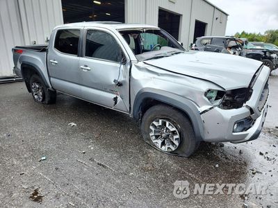Czwarte zdjęcie samochodu z boku: 2023 TOYOTA TACOMA TRD OFF-ROAD VIN:3TMCZ5AN4PM597204 - miniatura