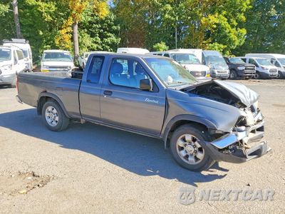 Czwarte zdjęcie samochodu z boku: 2000 NISSAN FRONTIER XE VIN:1N6DD26S3YC300634 - miniatura