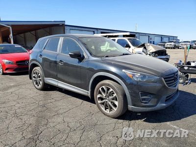 Czwarte zdjęcie samochodu z boku: 2016 MAZDA CX-5 GT VIN:JM3KE2DY0G0627319 - miniatura