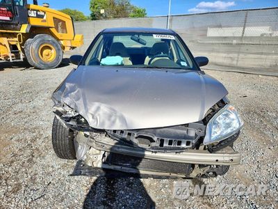 Piąte zdjęcie samochodu w środku: 2004 HONDA CIVIC LX VIN:2HGES16644H644332 - miniatura