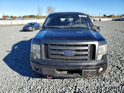 Piąte zdjęcie samochodu w środku: 2014 FORD F150 SUPERCREW VIN:1FTFW1EF0EFB89149 - miniatura