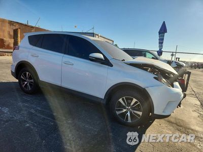 Czwarte zdjęcie samochodu z boku: 2018 TOYOTA RAV4 XLE VIN:JTMWFREV5JJ153275 - miniatura