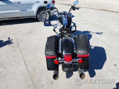 Czwarte zdjęcie samochodu z boku: 2015 HARLEY-DAVIDSON FLHR ROAD KING VIN:1HD1FBM12FB660098 - miniatura