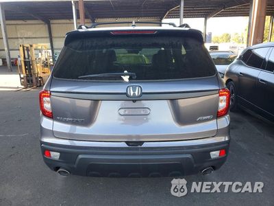 Zdjęcie 6 z 12 samochodu: 2021 HONDA PASSPORT EXL VIN:5FNYF8H59MB021680 - miniatura