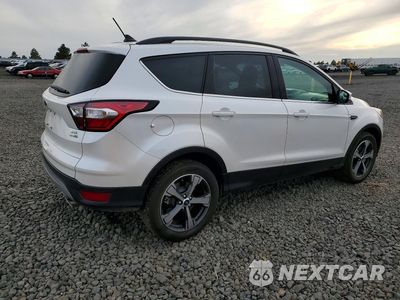 Trzecie zdjęcie samochodu z tyłu: 2018 FORD ESCAPE SEL VIN:1FMCU9HD7JUA86801 - miniatura