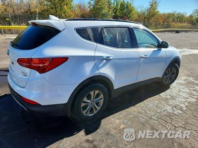 Trzecie zdjęcie samochodu z tyłu: 2016 HYUNDAI SANTA FE SPORT 2.4L VIN:5XYZUDLB4GG320006 - miniatura