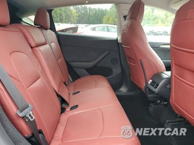 Zdjęcie 11 z 14 samochodu: 2024 TESLA MODEL Y VIN:7SAYGDEFXRA323005 - miniatura