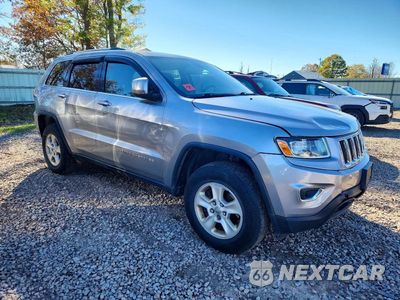 Czwarte zdjęcie samochodu z boku: 2014 JEEP GRAND CHEROKEE LAREDO VIN:1C4RJFAG4EC180852 - miniatura