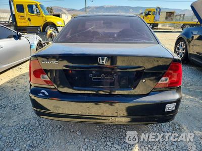 Zdjęcie 6 z 12 samochodu: 2003 HONDA CIVIC LX VIN:1HGEM22593L038751 - miniatura