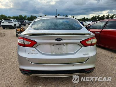 Zdjęcie 6 z 12 samochodu: 2013 FORD FUSION TITANIUM VIN:3FA6P0K97DR138373 - miniatura
