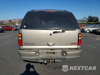 Zdjęcie 6 z 13 samochodu: 2001 GMC DENALI VIN:1GKEK63U41J263609 - miniatura