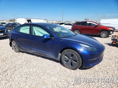 Czwarte zdjęcie samochodu z boku: 2023 TESLA MODEL 3 VIN:5YJ3E1EA1PF544329 - miniatura