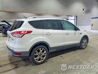 Trzecie zdjęcie samochodu z tyłu: 2015 FORD ESCAPE TITANIUM VIN:1FMCU0J98FUA88131 - miniatura