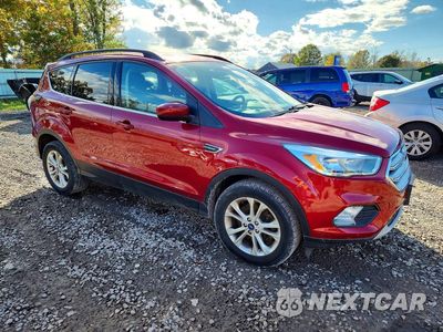 Czwarte zdjęcie samochodu z boku: 2018 FORD ESCAPE SE VIN:1FMCU9GD2JUB02016 - miniatura