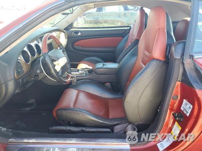 Zdjęcie 7 z 12 samochodu: 2004 JAGUAR XKR VIN:SAJDA42B343A38478 - miniatura
