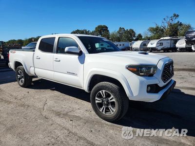 Czwarte zdjęcie samochodu z boku: 2017 TOYOTA TACOMA TRD SPORT VIN:3TMDZ5BN8HM017859 - miniatura