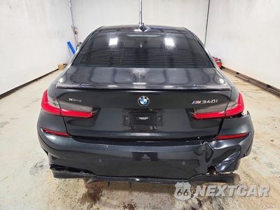 Zdjęcie 6 z 12 samochodu: 2021 BMW M340XI VIN:3MW5U9J03M8B63456 - miniatura