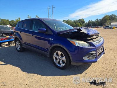 Czwarte zdjęcie samochodu z boku: 2016 FORD ESCAPE SE VIN:1FMCU0G77GUA91240 - miniatura