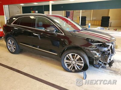 Czwarte zdjęcie samochodu z boku: 2020 CADILLAC XT5 PREMIUM LUXURY VIN:1GYKNCRS1LZ143842 - miniatura