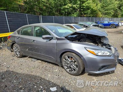 Czwarte zdjęcie samochodu z boku: 2018 NISSAN ALTIMA 2.5 SR VIN:1N4AL3AP1JC212338 - miniatura