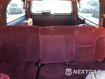 Zdjęcie 10 z 13 samochodu: 1999 GMC SUBURBAN C1500 VIN:1GKEC16R9XJ752121 - miniatura