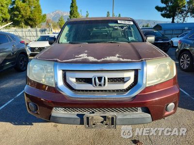 Piąte zdjęcie samochodu w środku: 2011 HONDA PILOT LX VIN:5FNYF3H20BB016132 - miniatura