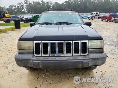 Piąte zdjęcie samochodu w środku: 1997 JEEP GRAND CHEROKEE LAREDO VIN:1J4FX58S7VC724129 - miniatura