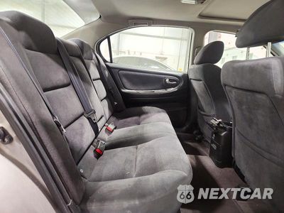 Zdjęcie 10 z 12 samochodu: 2002 NISSAN MAXIMA GXE VIN:JN1DA31D32T430370 - miniatura