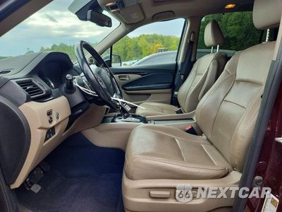 Zdjęcie 7 z 13 samochodu: 2016 HONDA PILOT ELITE VIN:5FNYF6H04GB111302 - miniatura