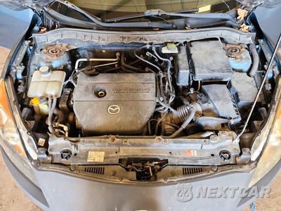 Zdjęcie 11 z 12 samochodu: 2010 MAZDA 3 I VIN:JM1BL1SF2A1276859 - miniatura
