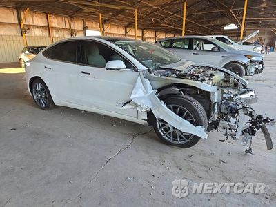 Czwarte zdjęcie samochodu z boku: 2019 TESLA MODEL 3 VIN:5YJ3E1EAXKF486469 - miniatura