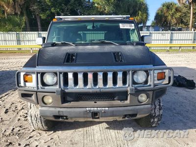 Piąte zdjęcie samochodu w środku: 2003 HUMMER H2 VIN:5GRGN23U23H109588 - miniatura