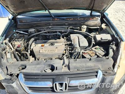 Zdjęcie 12 z 13 samochodu: 2004 HONDA CR-V EX VIN:JHLRD78814C000434 - miniatura