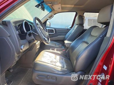 Zdjęcie 7 z 12 samochodu: 2006 HONDA RIDGELINE VIN:2HJYK16516H538504 - miniatura