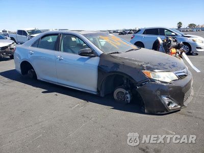 Czwarte zdjęcie samochodu z boku: 2012 TOYOTA CAMRY HYBRID XLE VIN:4T1BD1FK1CU024361 - miniatura