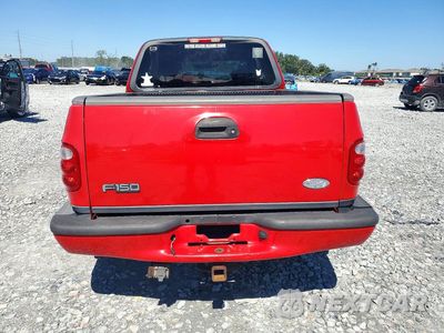 Zdjęcie 6 z 12 samochodu: 2003 FORD F150 VIN:1FTRX07W13KB58515 - miniatura